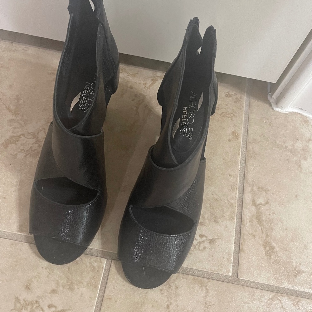 Black leather shoes with heel